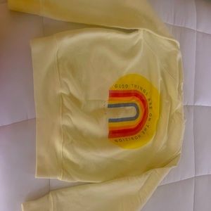 Spiritual Gangster sweatshirt rainbow detail. “Good things are on the horizon”